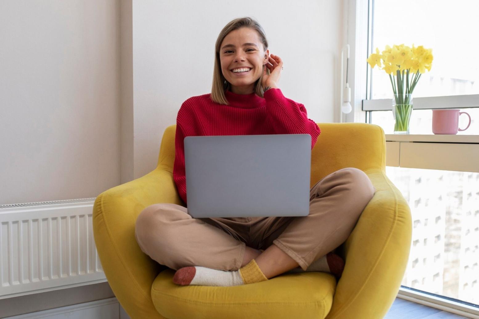 Person analyzing financial documents with focused concentration