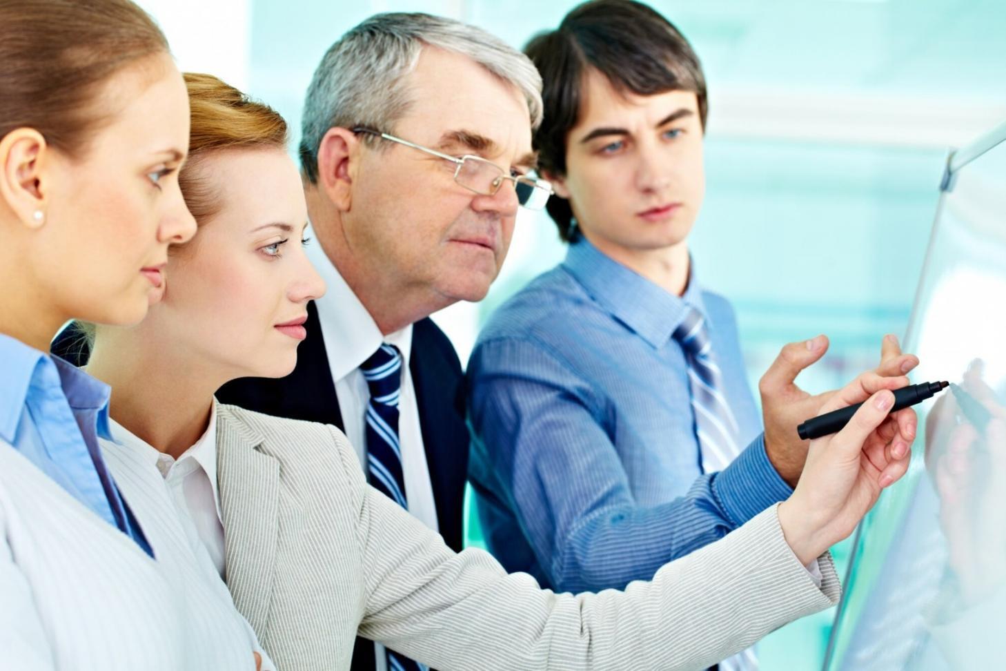 Educational workshop environment demonstrating collaborative financial psychology learning